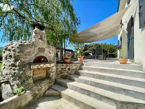 Maison 98 m² sur terrain arboré de 6 440 m² avec piscine