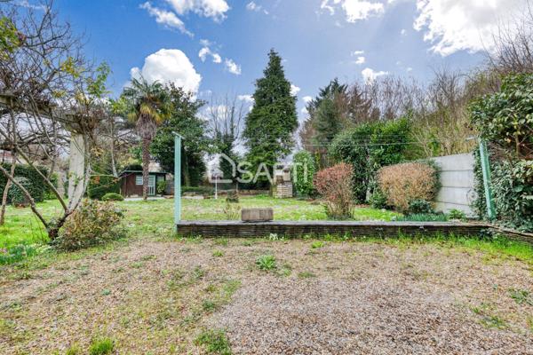 Maison familiale avec grand jardin arboré