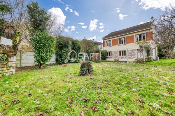 Maison familiale avec grand jardin arboré