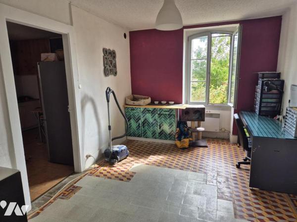 APPARTEMENT 4 PIECES REZ DE CHAUSSE AVEC JARDIN