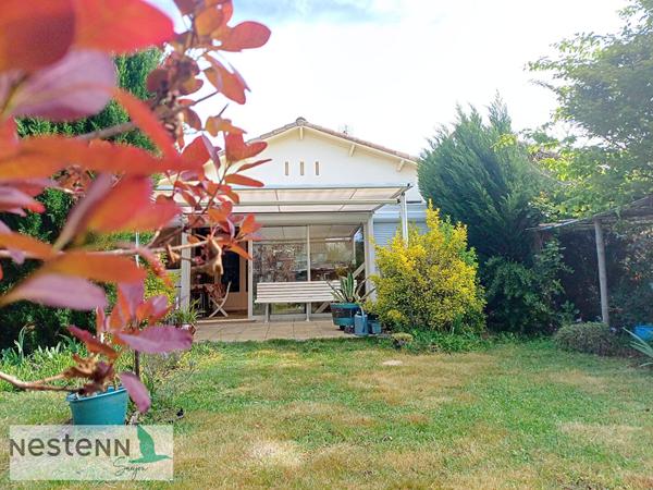 A vendre maison 70m², 2 chambres, un bureau, garages, terrain dans quartier résidentiel de 678 m²