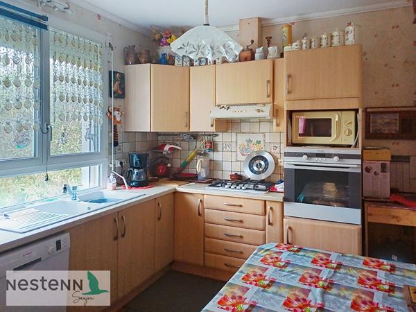 A vendre maison 70m², 2 chambres, un bureau, garages, terrain dans quartier résidentiel de 678 m²