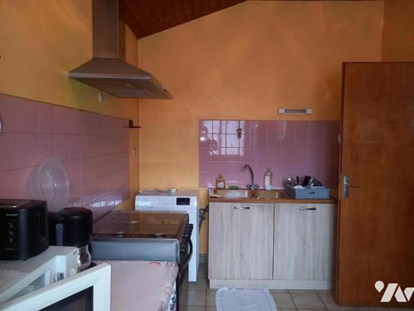 Maison ancienne avec petit terrain attenant 