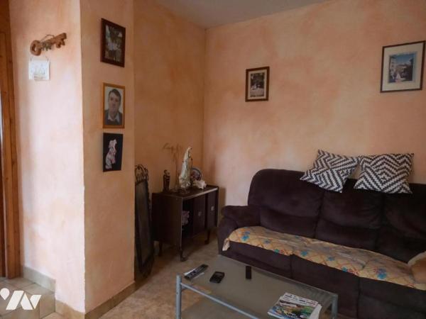 Maison ancienne avec petit terrain attenant 