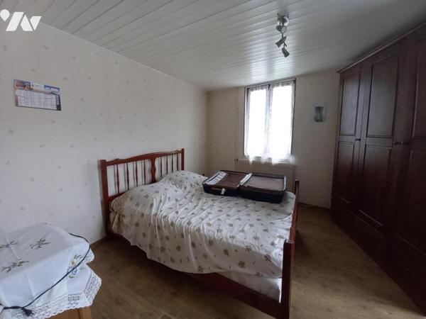 Maison ancienne avec petit terrain attenant 