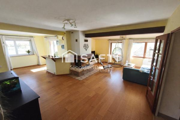 À Reiningue, vivez comme dans une maison individuelle au cœur de la nature, avec une vue dégagée sur les champs, 163 m² de confort, 2000 m² de terrain et un calme absolu