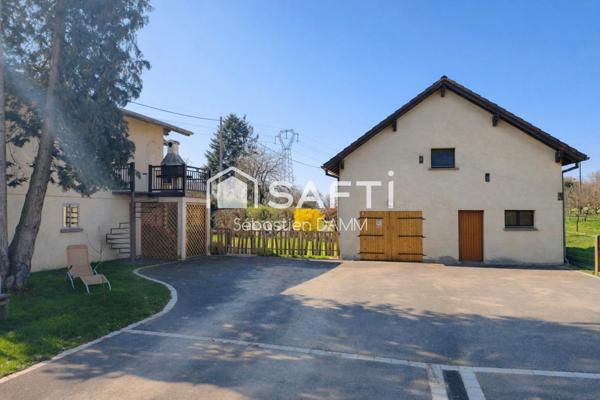 À Reiningue, vivez comme dans une maison individuelle au cœur de la nature, avec une vue dégagée sur les champs, 163 m² de confort, 2000 m² de terrain et un calme absolu