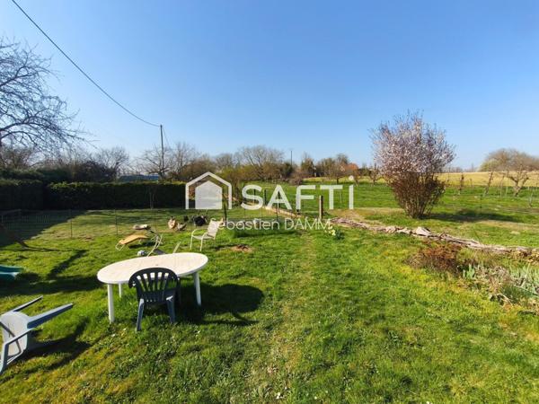 À Reiningue, vivez comme dans une maison individuelle au cœur de la nature, avec une vue dégagée sur les champs, 163 m² de confort, 2000 m² de terrain et un calme absolu