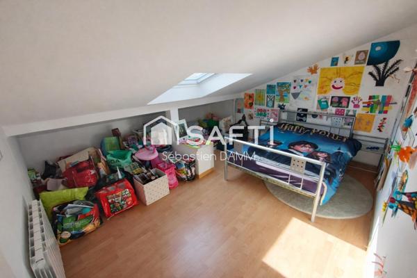 À Reiningue, vivez comme dans une maison individuelle au cœur de la nature, avec une vue dégagée sur les champs, 163 m² de confort, 2000 m² de terrain et un calme absolu