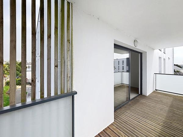 Appartement 2 chambres, balcon, ascenseur, place de parking - Lanester, rives du scorf