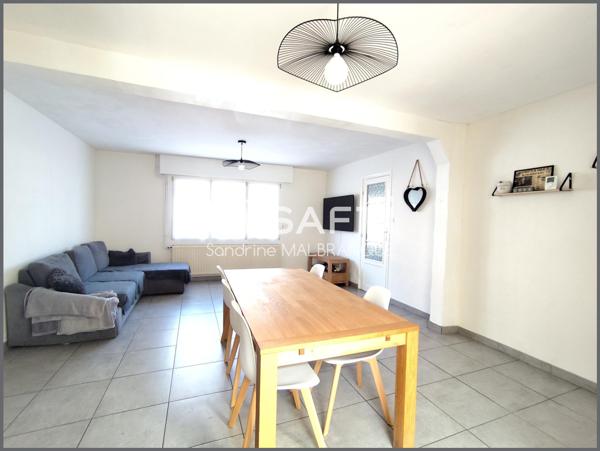 Maison de semi plain pied 4 chambres, garage et jardin