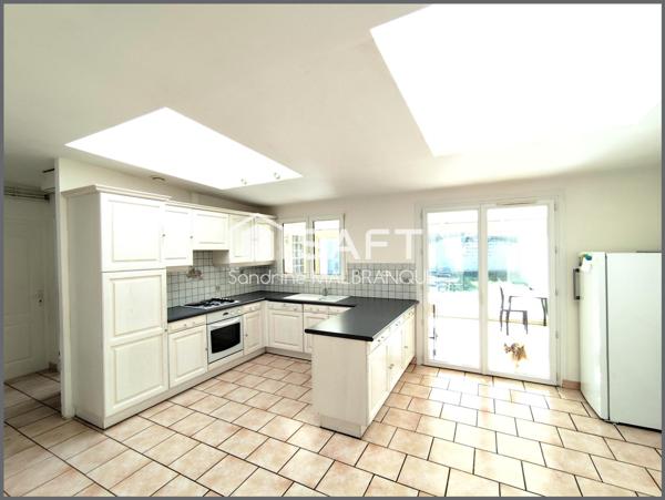 Maison de semi plain pied 4 chambres, garage et jardin