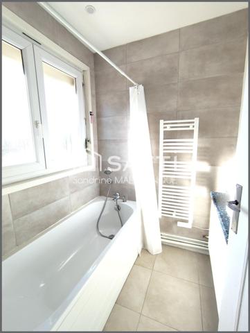 Maison de semi plain pied 4 chambres, garage et jardin