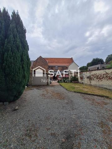 IMMEUBLE A CONFORTER pour investisseurs ou grande famille à 15 kms de Lille avec la proximité d'une gare