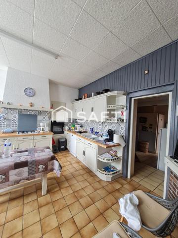IMMEUBLE A CONFORTER pour investisseurs ou grande famille à 15 kms de Lille avec la proximité d'une gare