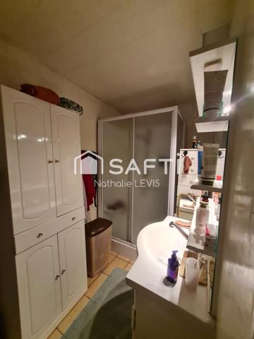 IMMEUBLE A CONFORTER pour investisseurs ou grande famille à 15 kms de Lille avec la proximité d'une gare