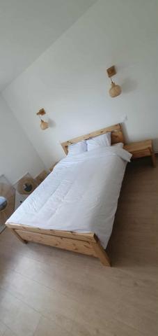 Appartement 1 etage - 2 chambres - box garage - aucun travaux - cuisiné équipée - séjour salon - double exposition - idéal jeune couple - étudiant - femme avec enfants