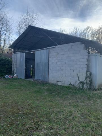 Terrain avec CU constructible et Hangar