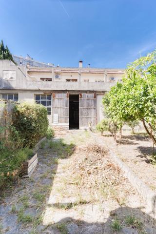 ENSEMBLE DE DEUX IMMEUBLES AVEC GARAGES ET HANGAR