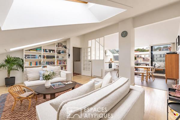 Penthouse confidentiel et terrasse plein ciel face au clocher du vieux Saint-Cloud.