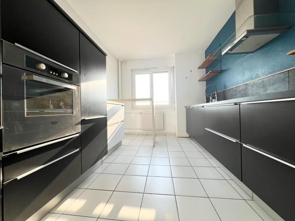 Appartement T3 de 99m2 de surface habitable avec grand balcon et une cave