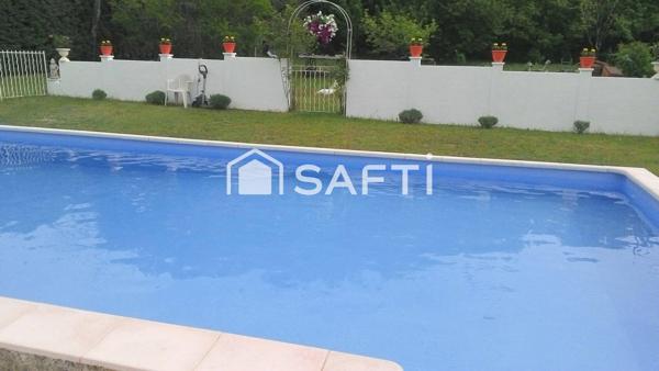 Villa 156 m², terrain 2 200 m², piscine et garages