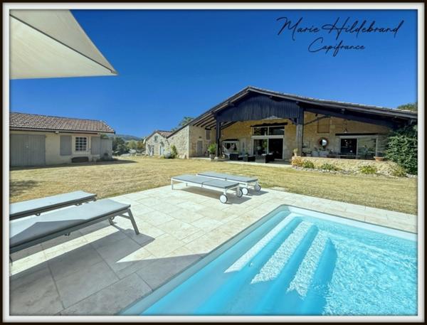 Maison en pierre de plus de 220m² - 5 chambres - jardin, piscine, dépendances - 3600m²