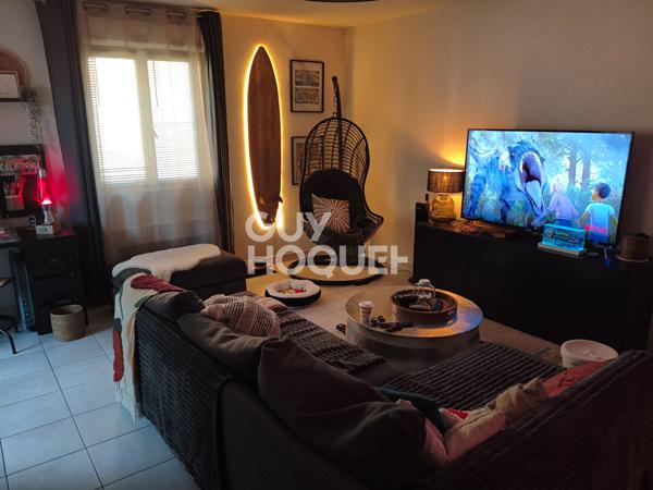 Appartement type 3 en rez-de-chaussée - 63 m² - balcon et stationnements dans résidence sécurisée -