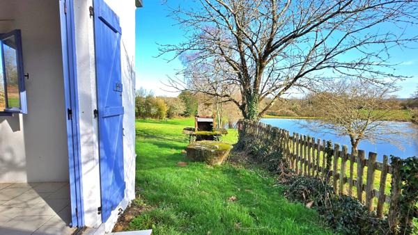 TERRAIN DE LOISIR AVEC ETANG ET MAISONNETTE DE REPOS + APPENTI + GARAGE - CADRE CALME ET VERDOYANT