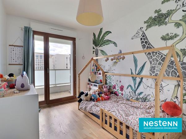 Appartement de type 4 de 80.33m² avec un grand balcon et garage en sous-sol situé sur le secteur de Villeurbanne LA SOIE