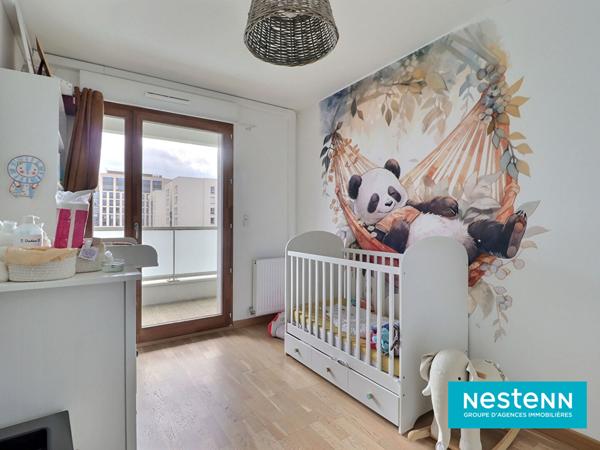 Appartement de type 4 de 80.33m² avec un grand balcon et garage en sous-sol situé sur le secteur de Villeurbanne LA SOIE