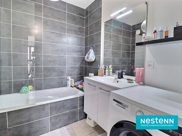 Appartement de type 4 de 80.33m² avec un grand balcon et garage en sous-sol situé sur le secteur de Villeurbanne LA SOIE