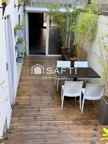 Immeuble d'habitation avec local commercial.