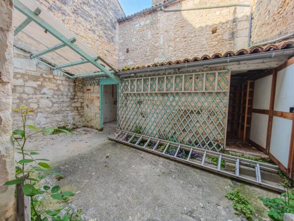 Maison 110m² avec 4 chambres et une cour