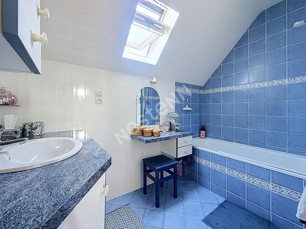 Maison à vendre à SAINT GEREON avec 4 chambres, bureau, garage et jardin.