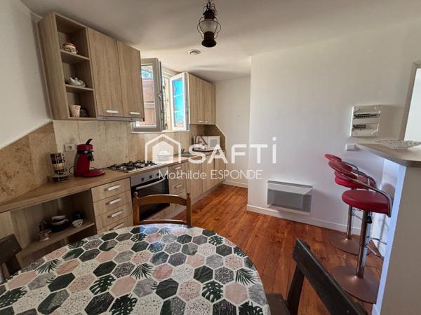 Maison de ville rénovée avec appartement indépendant, jardin et garages