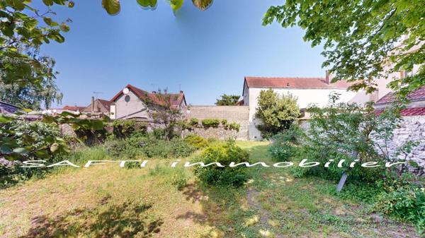 Rare en extrat centre de Bonnière-sur-Seine :  terrain constructible de 398m2  avec CU