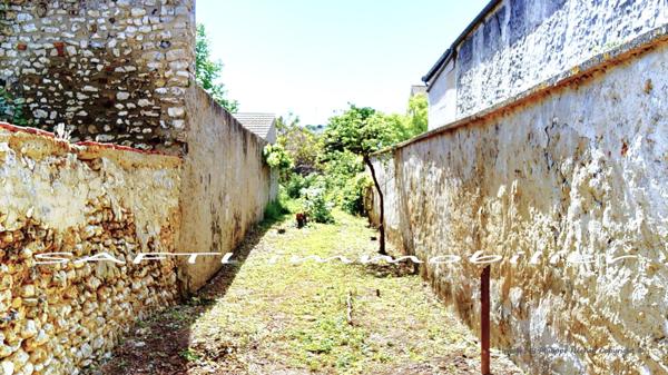 Rare en extrat centre de Bonnière-sur-Seine :  terrain constructible de 398m2  avec CU