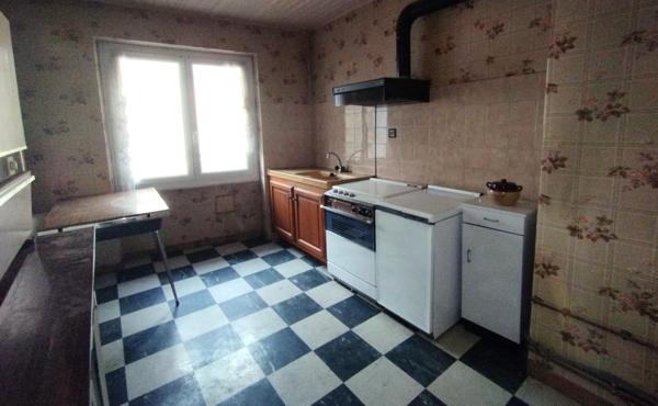 Appartement 64m² env. Lumineux, garage, cave.