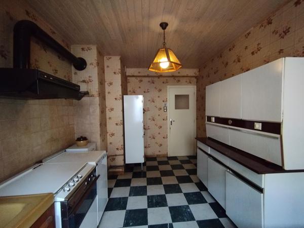 Appartement 64m² env. Lumineux, garage, cave.