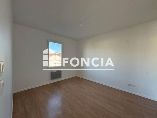 Location Appartement 2 pièces 46.15 m² - L'ILE 135 RUE POIZAT Montluel 01120