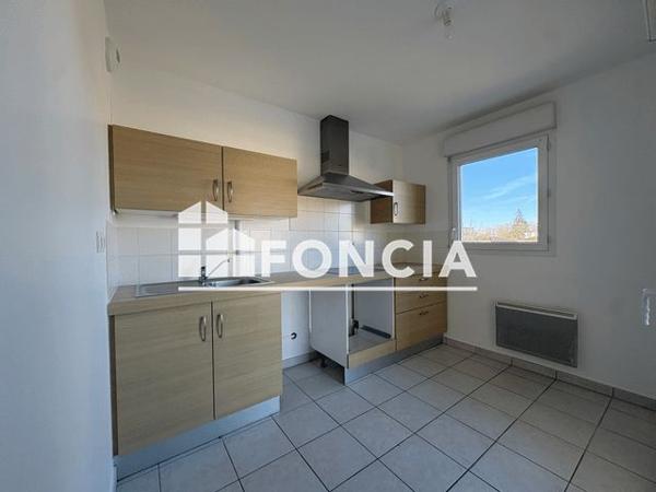 Location Appartement 2 pièces 46.15 m² - L'ILE 135 RUE POIZAT Montluel 01120