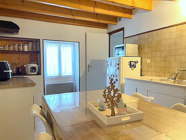 Ensemble immobilier 2 logements loués avec garages et espaces extérieurs