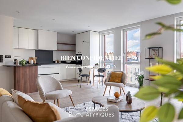 138 m² de volumes et lumière dans un duplex d’exception – Place de Bretagne
