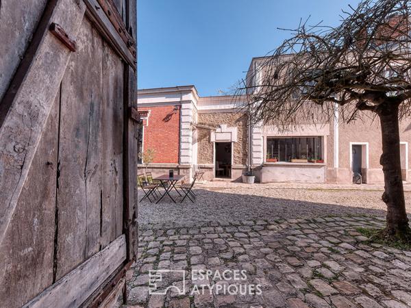 Maison de caractère en coeur de ville avec jardin et dépendances