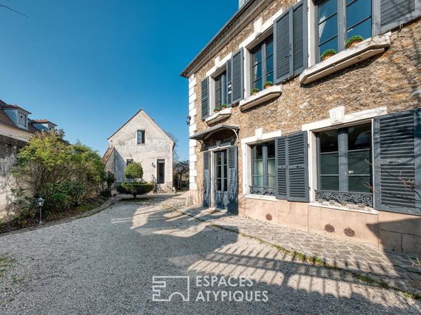 Maison de caractère en coeur de ville avec jardin et dépendances