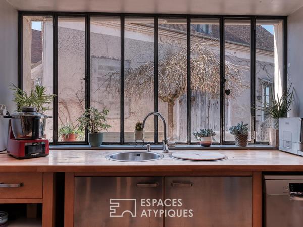 Maison de caractère en coeur de ville avec jardin et dépendances