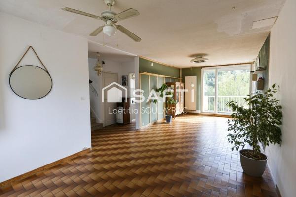 Maison d'environ 90m² avec garage et jardin au calme d'une impasse.