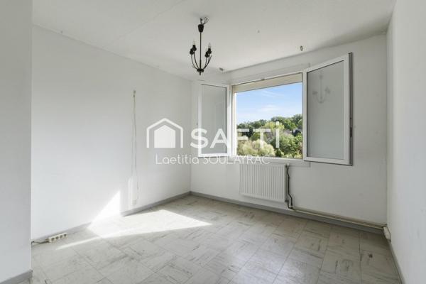 Maison d'environ 90m² avec garage et jardin au calme d'une impasse.