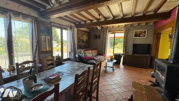 Située à MARIGNY, proche du bourg, maison avec vie de plain-pied 